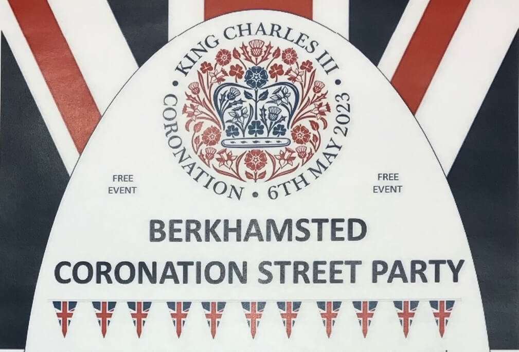 Union Jack and symbol of the crown in a poster for a Coronation Street Party